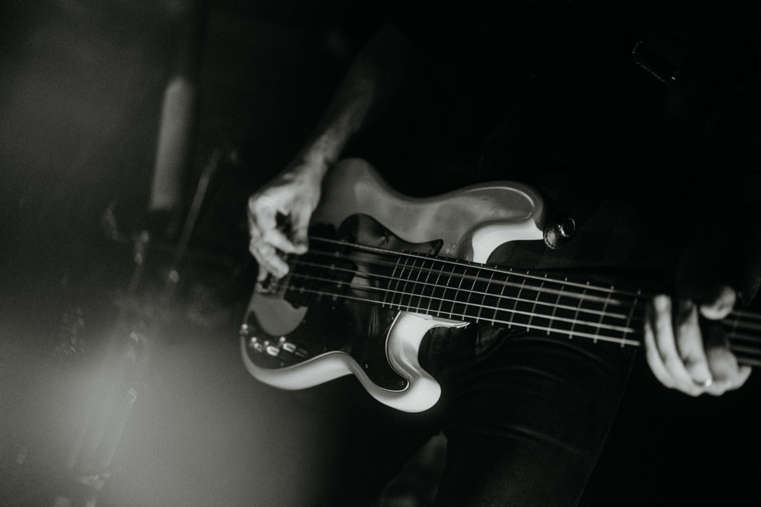 Close-up of Philipp Zimmermann's bass performance