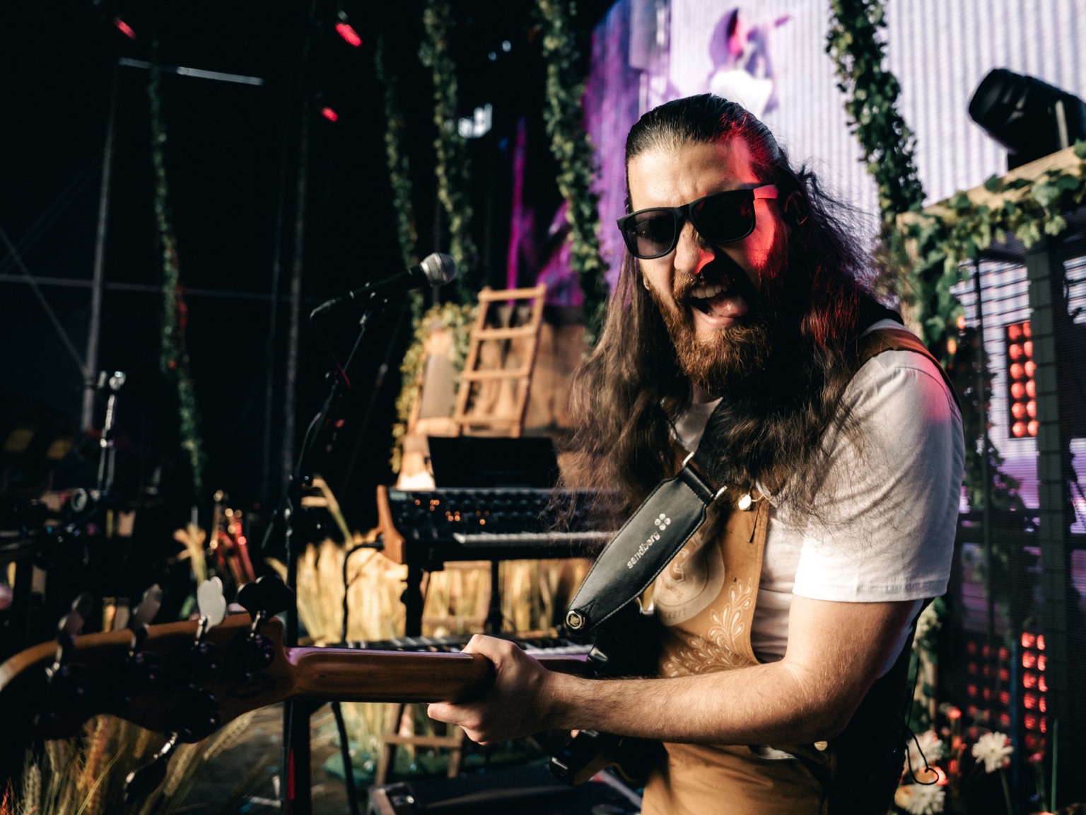 Philipp Zimmermann performing under colorful stage lights